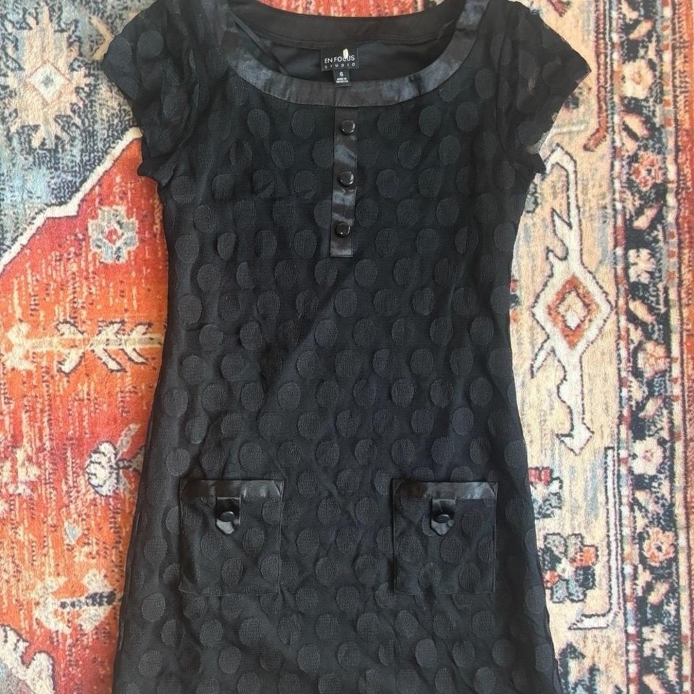 Mini black polka dot dress with pocket detailing